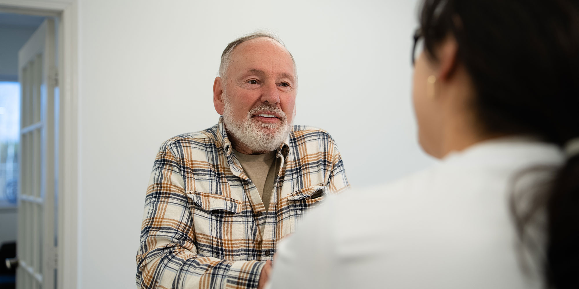 team member consulting with patient